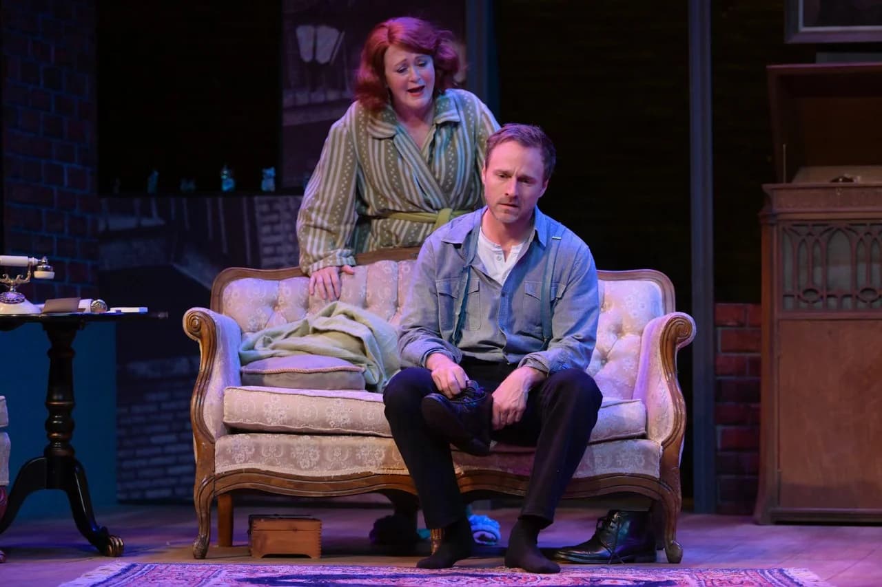 Scene emphasizing sightlines, negative space, and the elevated platform relationship in The Glass Menagerie.