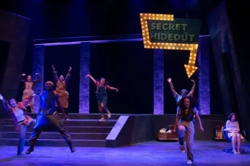 Urinetown scenic design cover image