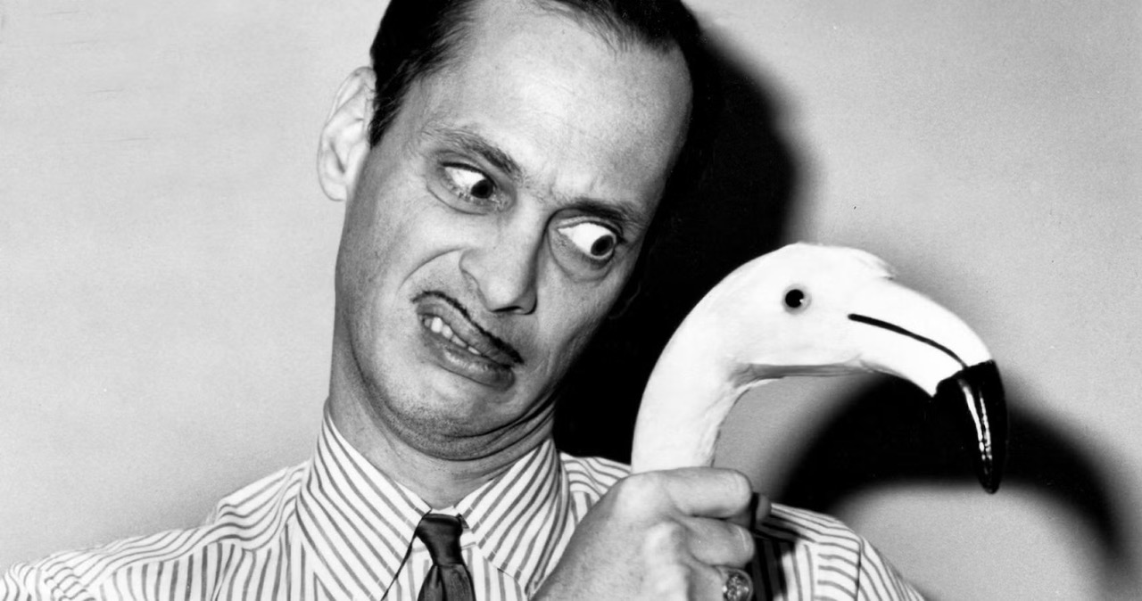 Black-and-white portrait of film director John Waters.