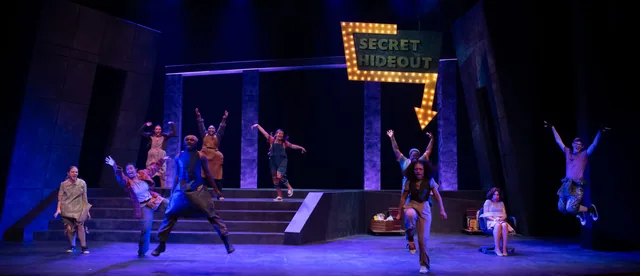 Production photograph for Urinetown at University of Missouri; scenic design by Brandon PT Davis.
