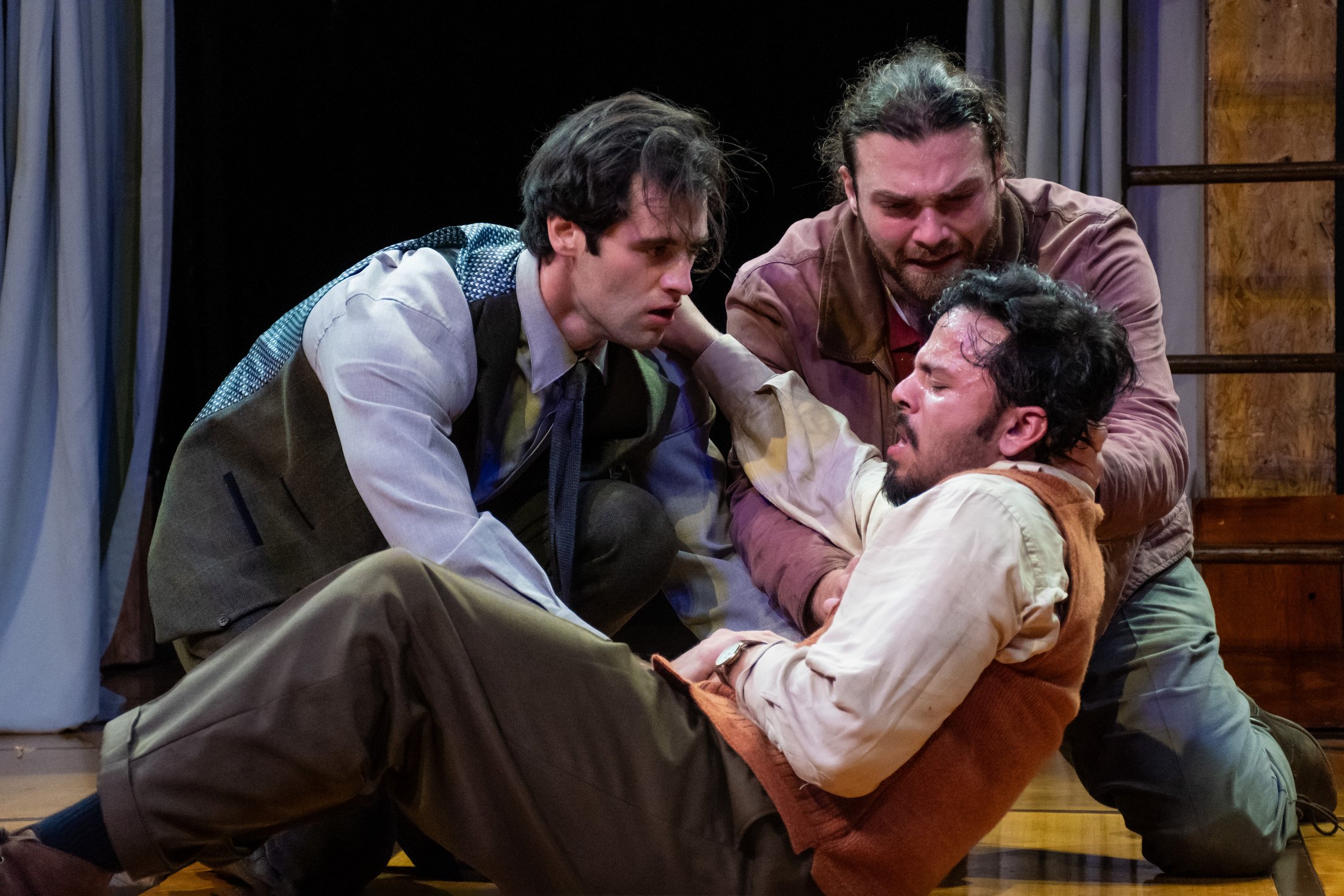 Actors struggle at the center of the stage within the spare Depression-era world.